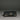 Closed black wedding ring box front view with matte wood finish and metal latch